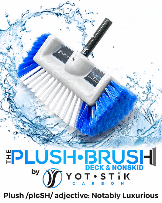 Plush brush with blue bristles in water, featuring Yot Stik branding.