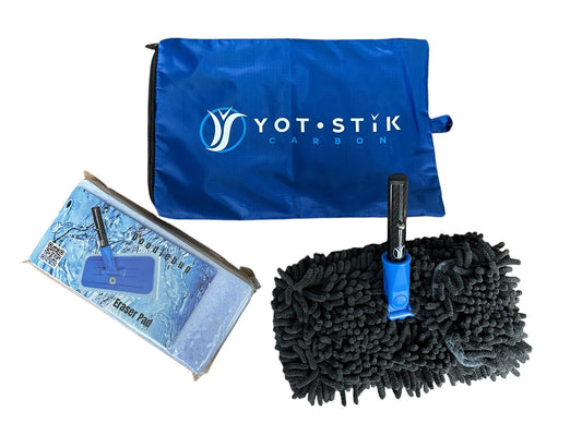 Yacht cleaning kit with microfiber cloth, eraser pad, and blue carrying bag on a white background